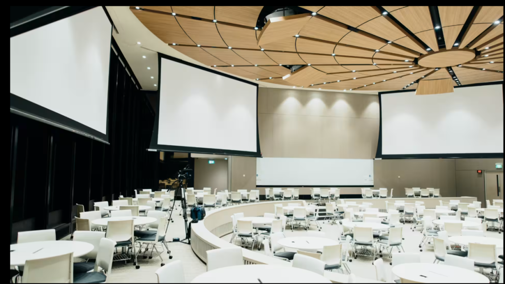 Corporate executives working with a corporate event planning partner during a leadership conference