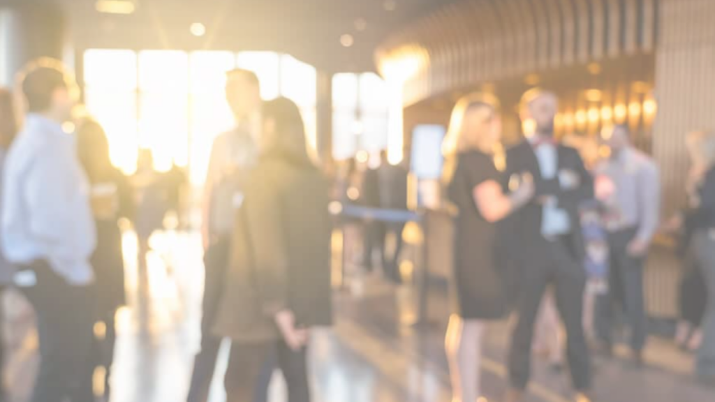 Professionals networking at a corporate event managed by illuminate EVENTS in Canada