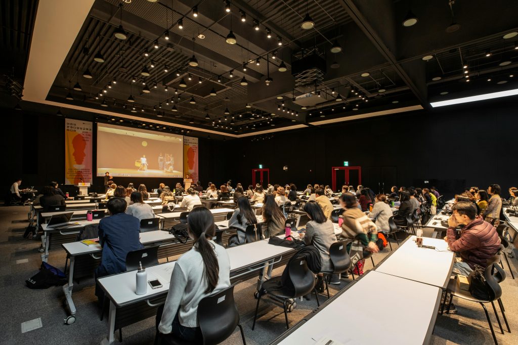 Corporate event management team coordinating a large conference — illuminate EVENTS