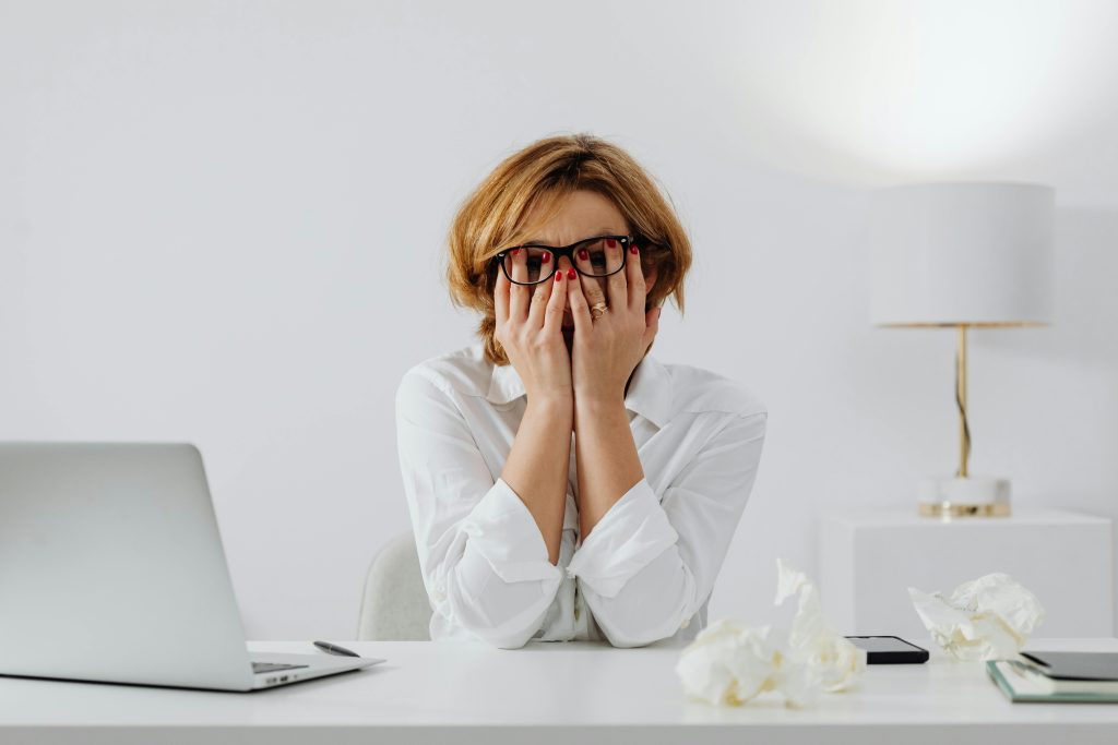 Overwhelmed in-house event planner managing multiple vendors without a corporate event management company